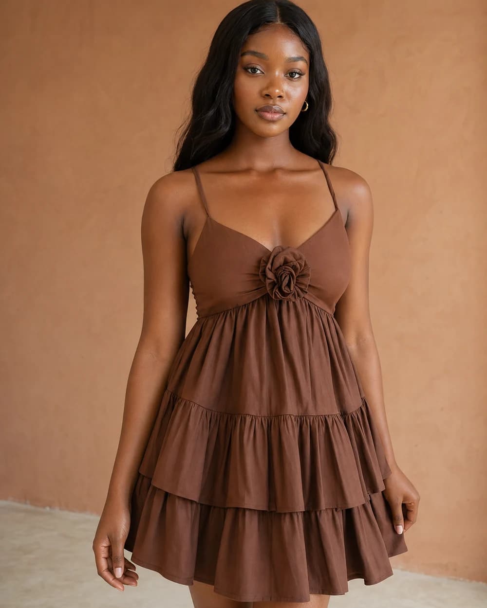 Brown tiered Gyidi dress with a floral front detail
